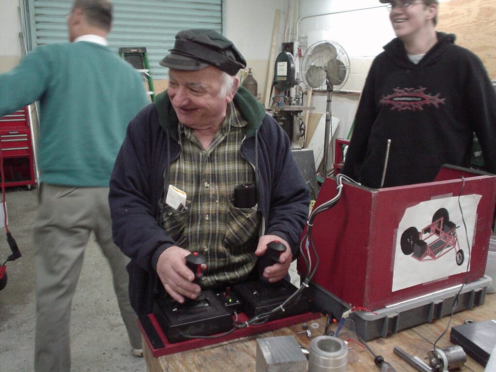 Al Culotta driving a robot, 2004