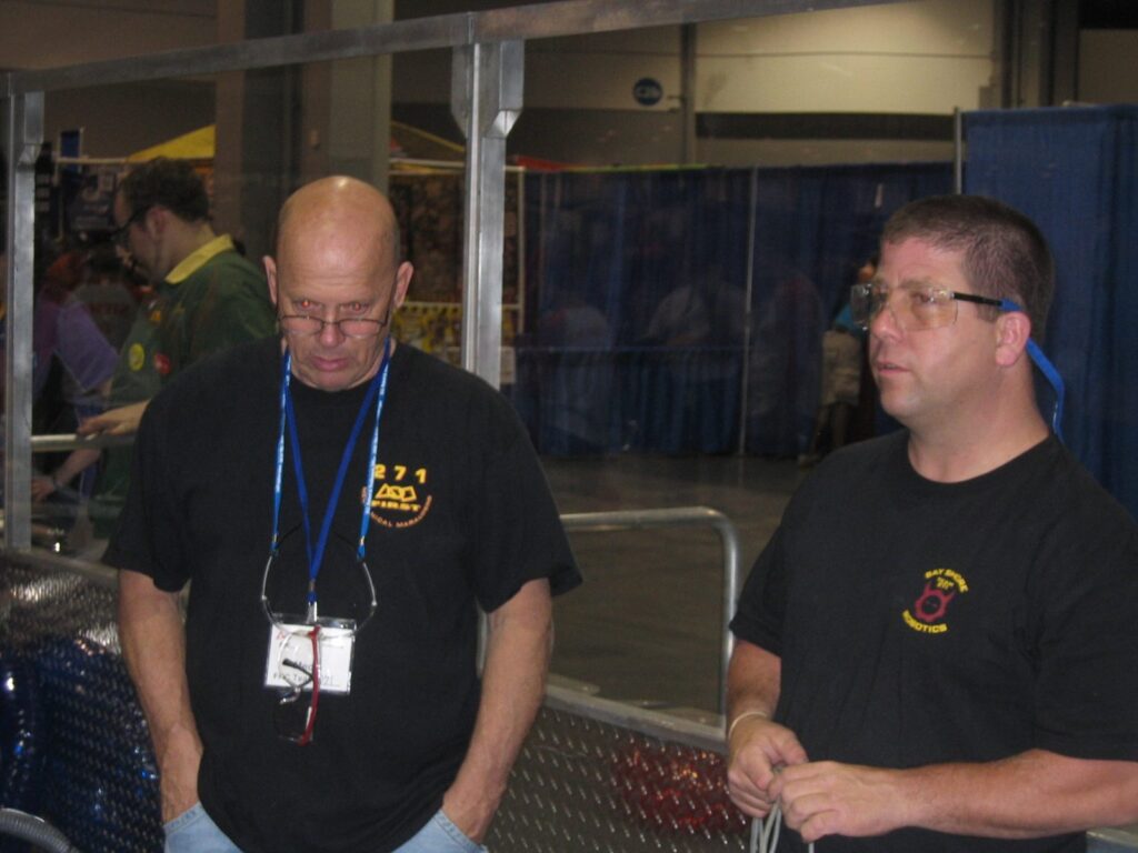 Pete Burke with a fellow mentor at the FIRST Championship in Atlanta, 2007