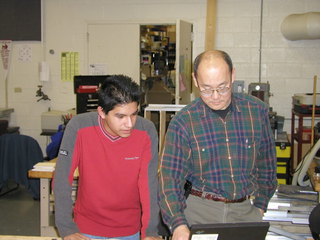 Sully Chen with a student, 2002