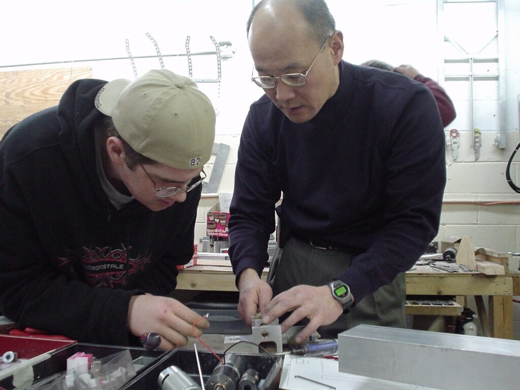 Sully Chen working with a student, 2004