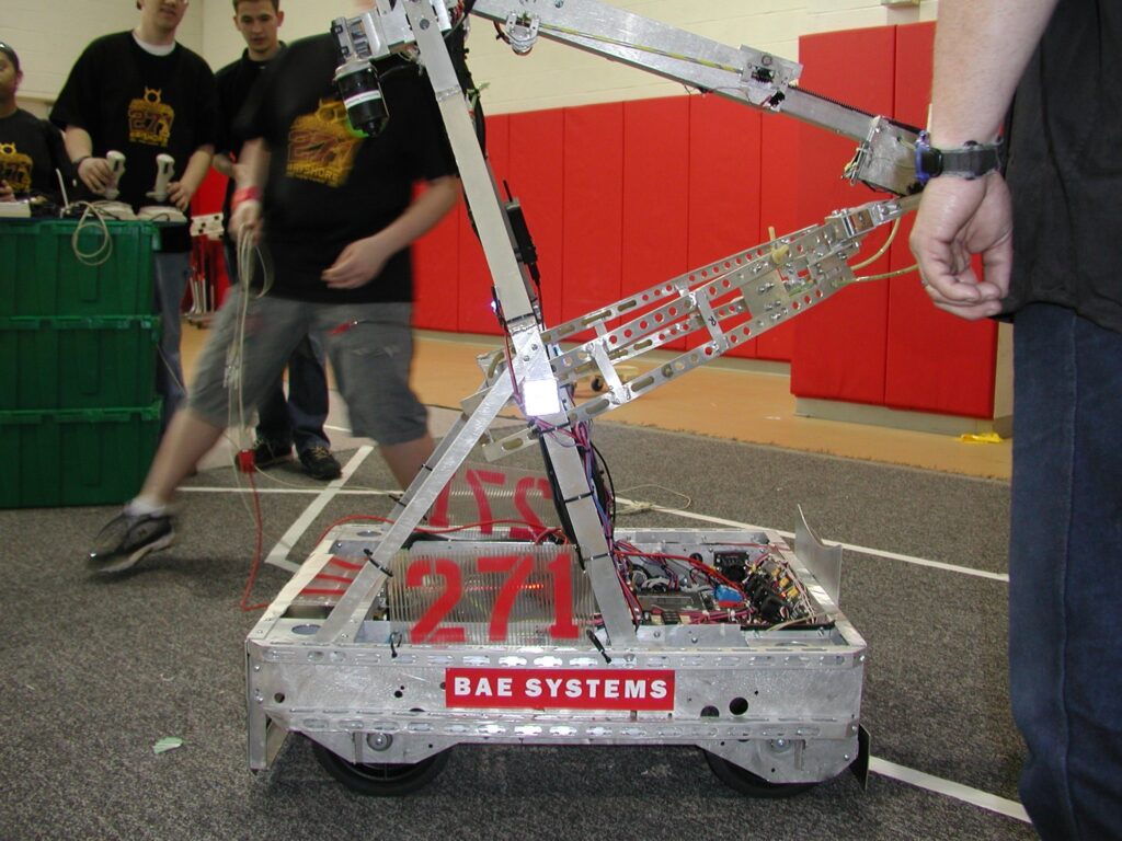 Team 271 2004 robot with BAE Systems sign on the field