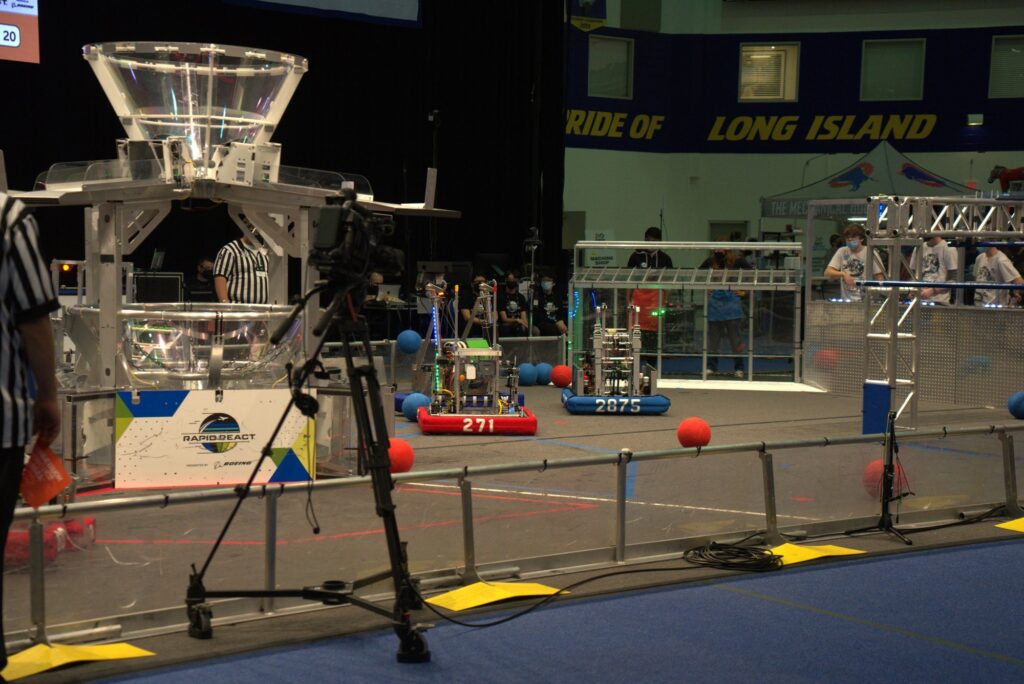 Team 271 2022 robot on the field beside the hub